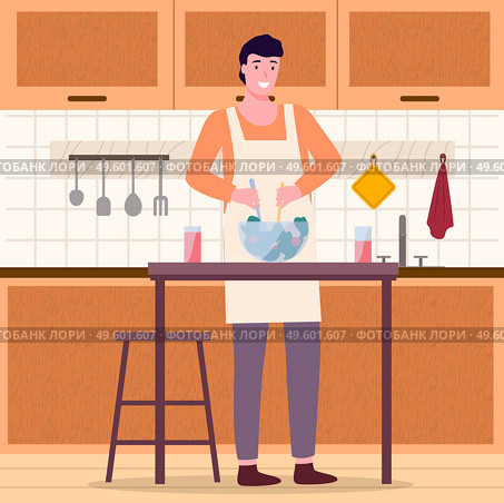Man cooking salad in the kitchen. Family dinner, father in the kitchen. Household activity, everyday duties and chores. Man in a kitchen apron stands near the table and prevents salad in a bowl. Young man cooking salad in the kitchen. Household activity, housekeeping, everyday duties and chores. Стоковая иллюстрация, агентство Ingram Publishing / Фотобанк Лори
