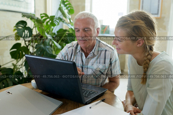 man in the office interviewing women for employment. Стоковое фото, агентство Ingram Publishing / Фотобанк Лори