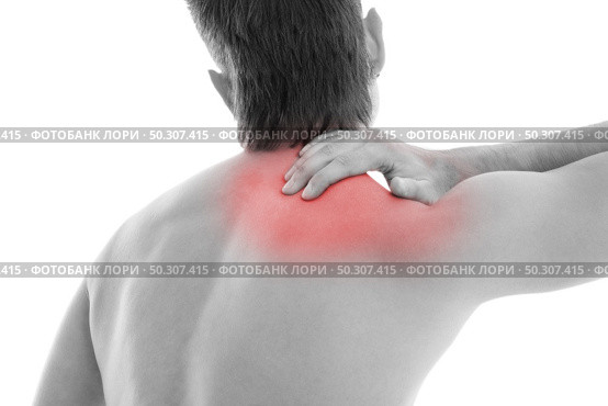 Man is touching his back because it aches. Стоковое фото, агентство Ingram Publishing / Фотобанк Лори