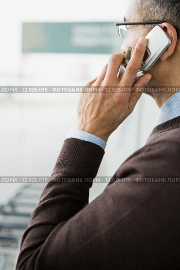 Man on cellphone. Стоковое фото, фотограф Shannon Fagan / PantherMedia / Фотобанк Лори