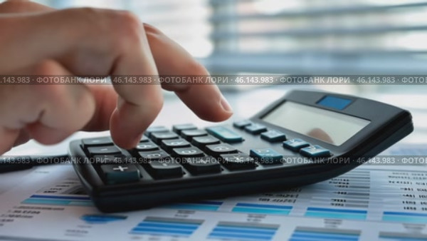Man pressing calculator close up. Desk with diagram, graph, finance. Investment, accounting, calculating tax, corporate financial company report. Person checking bills, bank account balance, expenses. Стоковое AI-видео, аниматор Марина Демидюк / Фотобанк Лори