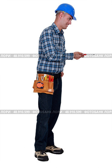 Man using screwdriver. Стоковое фото, агентство Ingram Publishing / Фотобанк Лори
