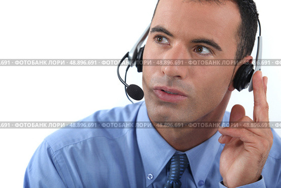 Man wearing a headset. Стоковое фото, агентство Ingram Publishing / Фотобанк Лори