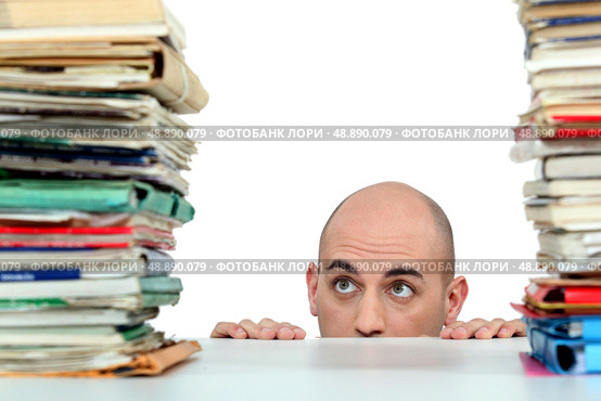 Man with piles of folders. Стоковое фото, агентство Ingram Publishing / Фотобанк Лори