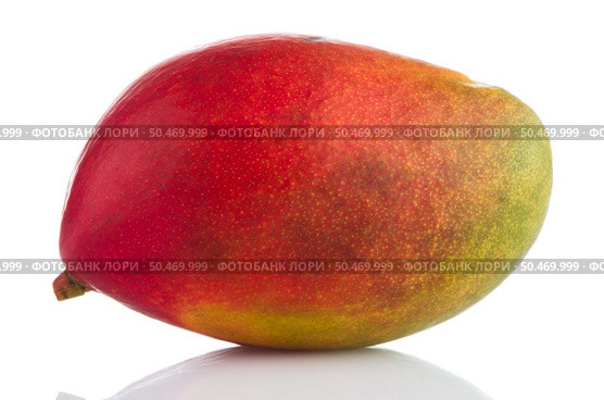 Mango fruit on white reflective background. Стоковое фото, агентство Ingram Publishing / Фотобанк Лори