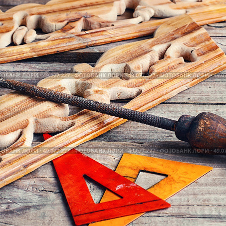 Manually sawn figured wood products and files for wood processing. Work on wood. Стоковое фото, агентство Ingram Publishing / Фотобанк Лори