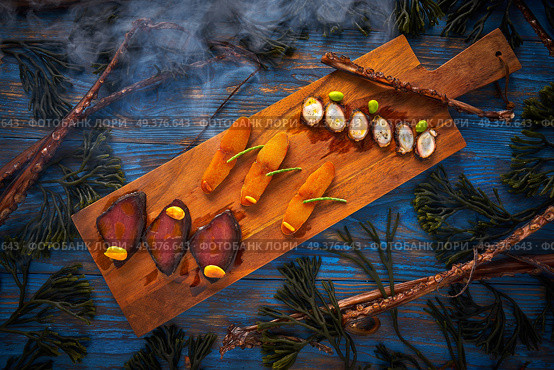 Marinated tuna roe and octopus salted smoked Mediterranean style with seaweed. Стоковое фото, агентство Ingram Publishing / Фотобанк Лори