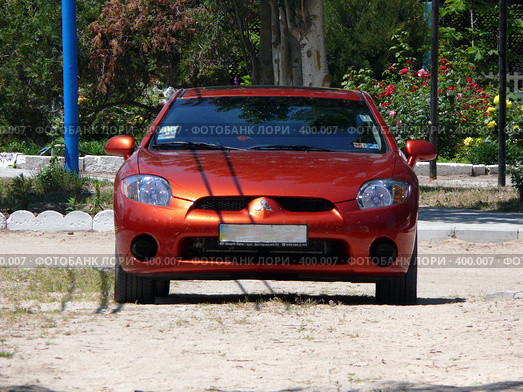 Mitsubishi Eclipse ("Мицубиси-Эклипс"). Вид спереди (2008 год). Редакционное фото, фотограф Иван Мацкевич / Фотобанк Лори