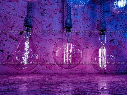 Modern and decorative Filament ligth bulb. Стоковое фото, агентство Ingram Publishing / Фотобанк Лори