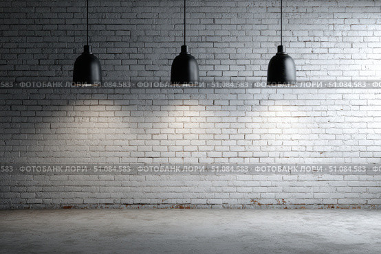 Modern black pendant lights with vintage light bulb hanging among bricks wall. Hanging ceiling light in a white shared office space. Decorative geometric metal lamp. Suspended chandelier loft style. Стоковое AI-изображение, AI-художник Марина Демидюк / Фотобанк Лори