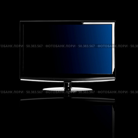 Modern lcd TV isolated over a black background with reflection. Стоковое фото, агентство Ingram Publishing / Фотобанк Лори