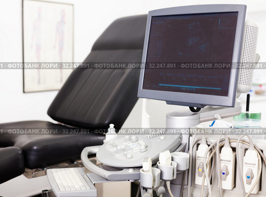 Modern medical equipment, medical ultrasound machine with probes in clinic. Стоковое фото, фотограф Яков Филимонов / Фотобанк Лори
