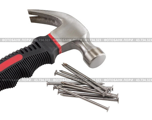 Молоток и гвозди на белом фоне. Hammer and nails on a white background. Стоковое фото, фотограф Татьяна Д / Фотобанк Лори