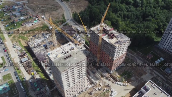 Moscow July 15 2022, Construction site with two buildings under construction. Редакционное видео, видеограф Скрипачев Антон / Фотобанк Лори