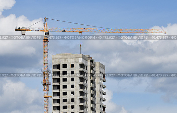 Moscow, Russia - 4 May.2023. Liebherr cranes build residential buildings in Zelenograd. Редакционное фото, фотограф Володина Ольга / Фотобанк Лори
