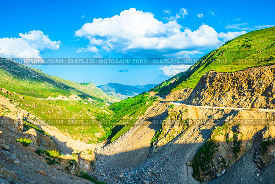 Mountain canyon with scree slopes and a road under construction in the mountains of the North Caucasus. Стоковое фото, фотограф Константин Лабунский / Фотобанк Лори