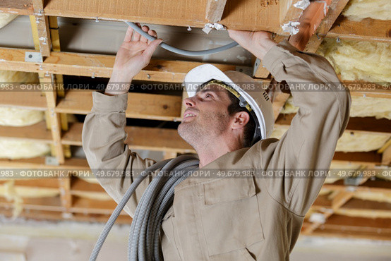 mounting for an electric cable in ceiling. Стоковое фото, агентство Ingram Publishing / Фотобанк Лори