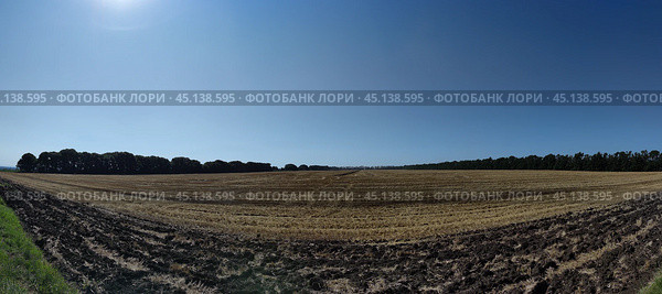 Mowed field under the clouds. Стоковое фото, фотограф Andrew_Swarga / Фотобанк Лори