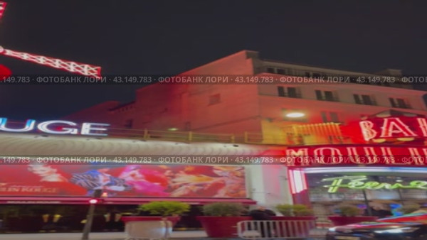Мулен руж неоновый свет Париж (2024 год). Редакционное видео, видеограф Елена Миловидова / Фотобанк Лори