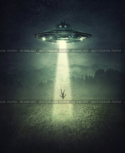 Mysterious alien spaceship abduction scene. Surreal concept with a levitating human stolen by the light of an UFO ship in a dark night on a open field. Стоковое фото, агентство Ingram Publishing / Фотобанк Лори