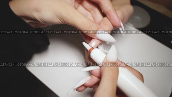 Nail Artist Using Electric File for Perfect Nail Shaping. Стоковое видео, видеограф Скоробогатова Е. / Фотобанк Лори