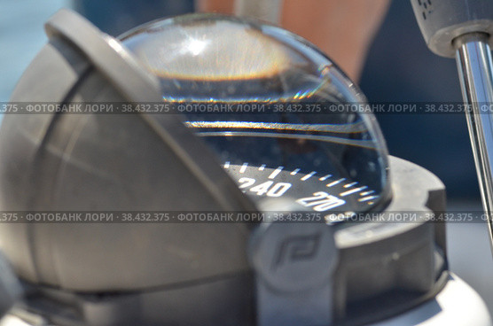 Nautic Compass detail navigation direction bullet sun. Стоковое фото, фотограф Andreas Muth-Hegener / Фотобанк Лори