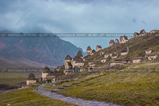 Некрополь Даргавс, Северная Осетия. Город мертвых (2021 год). Стоковое фото, фотограф Ника Денова / Фотобанк Лори