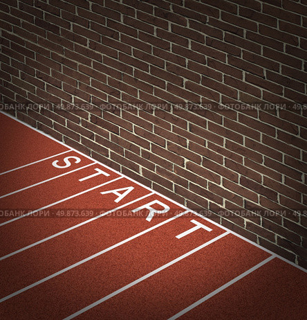New business problems as unaccessible closed opportunities and no access to financial oppotunities as a track and field race track start position with a brick wall blocking the way forward. Стоковое фото, агентство Ingram Publishing / Фотобанк Лори