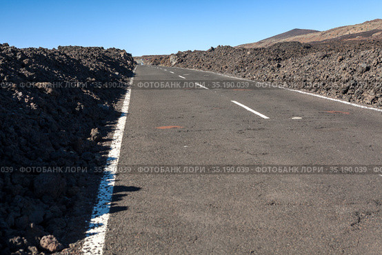 New high-speed lane leading to the Teide volcano among the lava stone heads. The Tenerife, Canary Islands, Spain. Стоковое фото, фотограф Кекяляйнен Андрей / Фотобанк Лори