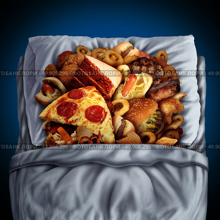 Night eating and late evening snacking concept as a food osession diet disorder with unhealthy junk food and snacks sleeping in bed as a midnight snack metaphor in a 3D illustration style. Стоковое фото, агентство Ingram Publishing / Фотобанк Лори