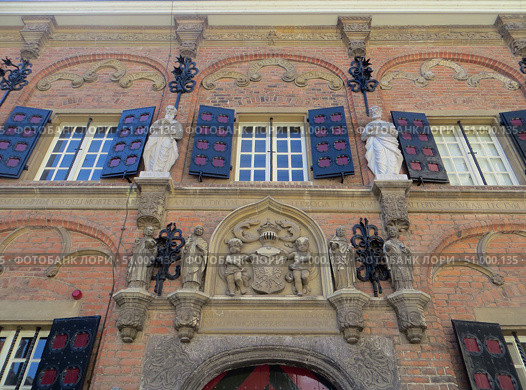 Nijmegen, Netherlands. May 11, 2025. City center. Spring. Sunny day. Facade view of the building of the Latijnse School dated 1545. Редакционное фото, фотограф Мария Фетисова / Фотобанк Лори