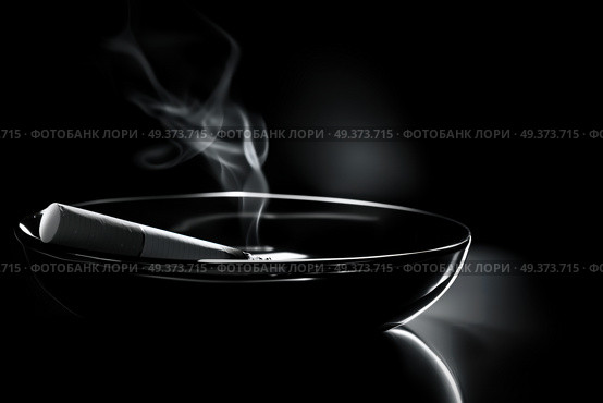 Одинокая сигарета в пепельнице дымится. Стоковое AI-изображение, AI-художник Александр Жуков / Фотобанк Лори