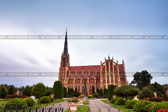 Old ancient castle. Holy Trinity Catholic Church in Gothic Revival style in Gervyaty village, Grodno region, Belarus. Стоковое фото, агентство Ingram Publishing / Фотобанк Лори