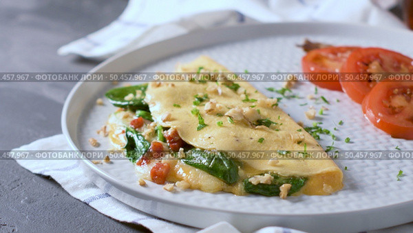 Omelet with vegetables on a plate. Стоковое фото, агентство Ingram Publishing / Фотобанк Лори