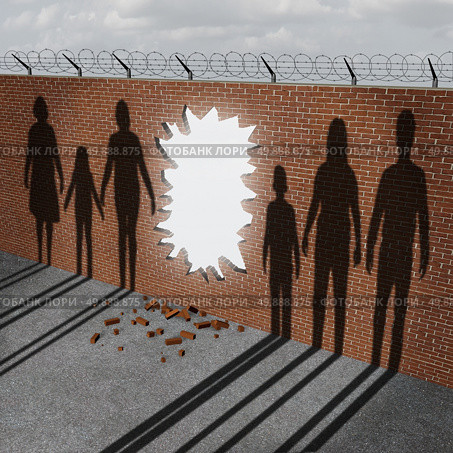 Open immigration and migration policy pertaining to a refugee crisis or illegal immigrants issues as a broken border wall with an entrance hole as a metaphor for gouvernment migration. Стоковое фото, агентство Ingram Publishing / Фотобанк Лори