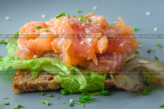 Open sandwich with red fish salmon and salad. Стоковое фото, фотограф Воловодов Владимир / Фотобанк Лори