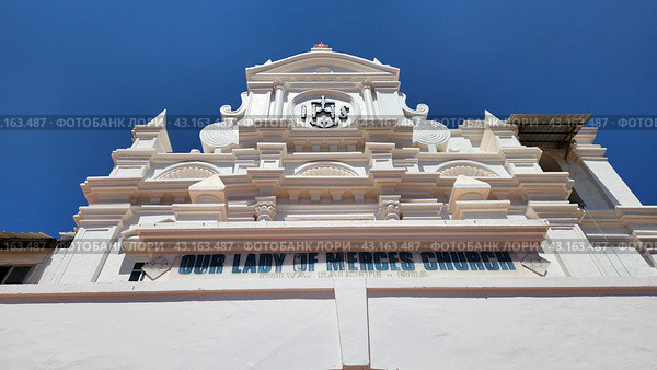 Our Lady of Mercy Church (Церковь Пресвятой Богородицы Милосердной). Улица Колва-Бич. Колва. Маргао. Южное Гоа. Индия (2023 год). Редакционное фото, фотограф lana1501 / Фотобанк Лори