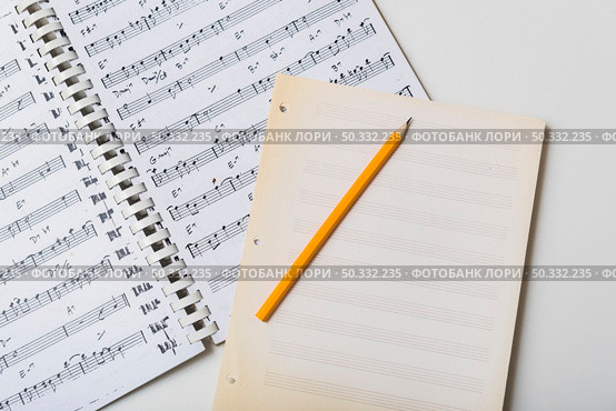 pencil mpty pages sheet music. High resolution photo. pencil mpty pages sheet music. High quality photo. Стоковое фото, агентство Ingram Publishing / Фотобанк Лори