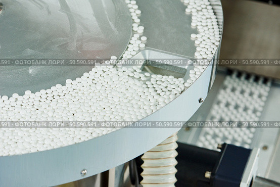 pharmaceutical medicine tablet pill production background at pharmacy industry manufacture. pharmacy medicine pill production background. Стоковое фото, агентство Ingram Publishing / Фотобанк Лори