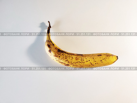 Photo of Overripe Banana on White Background. Стоковое фото, фотограф Константин Никитеев / Фотобанк Лори