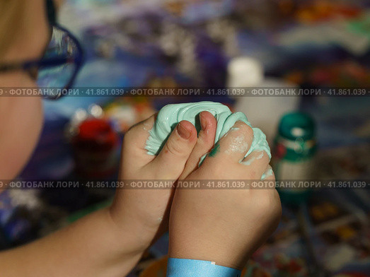 Photography of slime preparation. Master Class. Children' hands. Concepts of education, skills  development, game and childhood. Стоковое фото, фотограф YuryKara / Фотобанк Лори