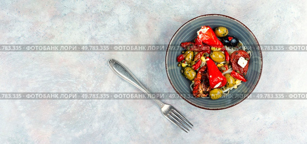 Pickled soya bean salad with pickled soybean sprouts, dried tomatoes, olives and peppers. Free space for your text.. Salad of preserved soy sprouts and pickled vegetables. Стоковое фото, агентство Ingram Publishing / Фотобанк Лори