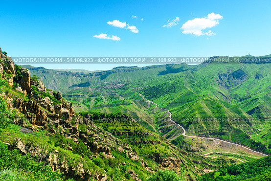 Picturesque landscape of green mountain slope with rock formations. North Caucasus (2024 год). Стоковое фото, фотограф Константин Лабунский / Фотобанк Лори