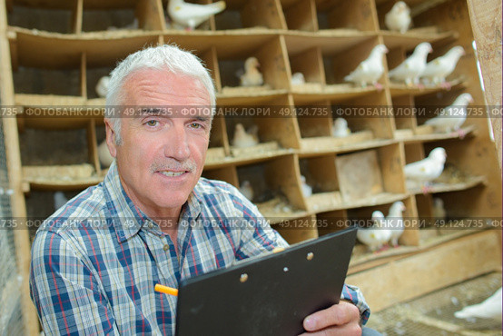 pigeon keeper. Стоковое фото, агентство Ingram Publishing / Фотобанк Лори