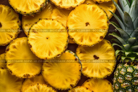 Pineapple slices background. Generate Ai. Стоковое AI-изображение, AI-художник Иван Рябоконь / Фотобанк Лори