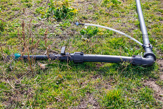Pipe for water supply for drip irrigation on an agricultural farm. Irrigation installation. Стоковое фото, фотограф Коханова Наталья / Фотобанк Лори