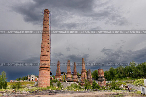 Pipes of old lime kilns on the abandoned marble and lime factory on a frosty January morning. Ruskeala, Karelia. Russia. Стоковое фото, фотограф Ольга Сейфутдинова / Фотобанк Лори