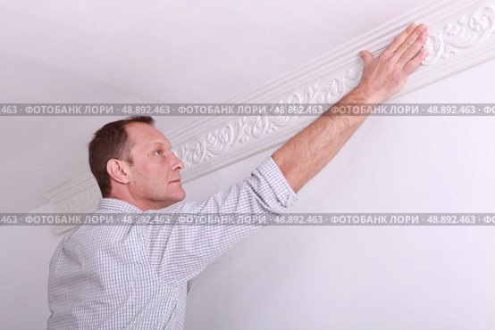 portrait of a man laying a frieze. Стоковое фото, агентство Ingram Publishing / Фотобанк Лори
