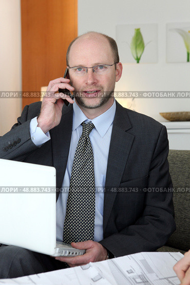 Portrait of an architect in his office. Стоковое фото, агентство Ingram Publishing / Фотобанк Лори