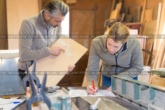 portrait of two carpenters workshop. Стоковое фото, агентство Ingram Publishing / Фотобанк Лори